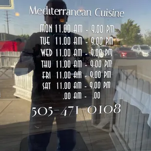 Front door with hours