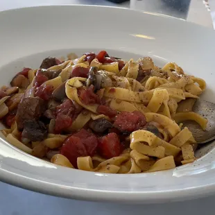 Filet mignon with fettuccini.