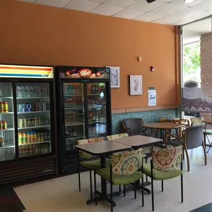 tables, chairs, and refrigerator