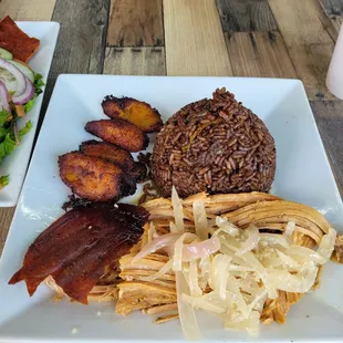 Roast pork,muro rice, and plantains.