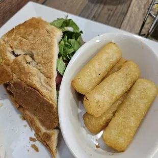 Luke warm roast pork sandwich, and the saddest $6.99 yucca fries.