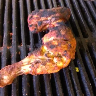 a piece of meat on a grill