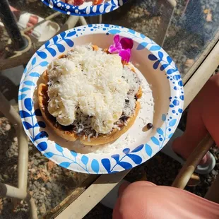 Waffle with Nutella, blueberries, bananas, and coconut.