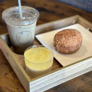 Iced hojicha latte, curry pan, yuzu panna cotta