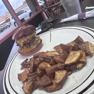 Cheeseburger with extra patty and hodgepodge potatoes