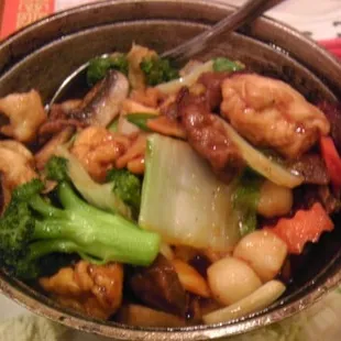 Chicken, pork, seafood and fried tofu in pot...another tasty dish.