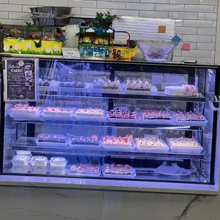 Bakery case filled with desserts