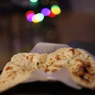 two flat breads on a table