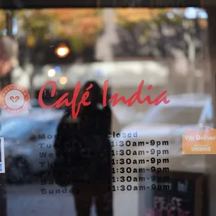 reflection of a person in the window