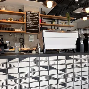 black and white tiled counter and shelves