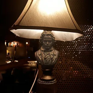 a bust and a lamp