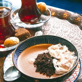 a bowl of soup and a cup of tea