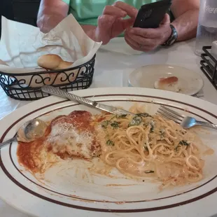 Partial meal of eggplant rotini with side of spaghetti