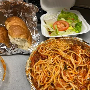Spaghetti Pasta with Meat Sauce, side salad and bread for 11.00 !!