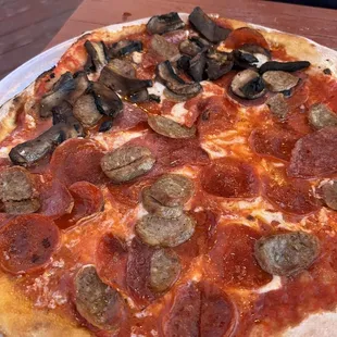 We added mushrooms to the meat pizza and asked for an extra crispy pie