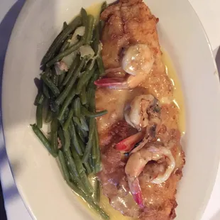 Pan fried catfish with green beans, topped with grilled shrimp