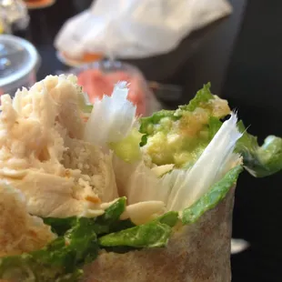 Paper not removed, and wrapped in a turkey wrap.  I ate half of it before I realized it.