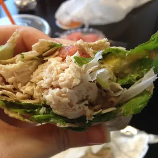 Paper not removed, and wrapped in a turkey wrap.  I ate half of it before I realized it.