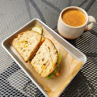 Veggie sandwich and coffee