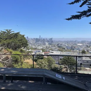 a view of the city from the top of a hill