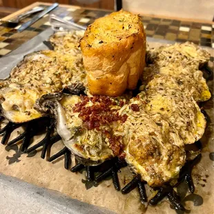 Trio oysters :  creamy lump crab meat Creamed spinach and house-made bacon Seafood etouffee sauce