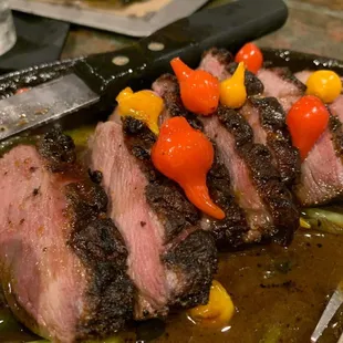 a steak with vegetables on a plate