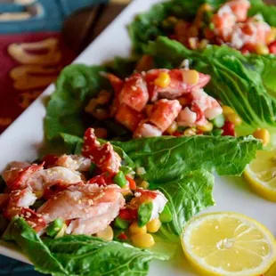 lobster lettuce wraps with corn and tomatoes