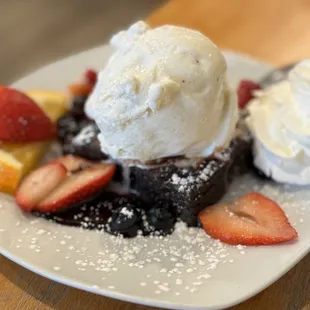 a dessert with ice cream and strawberries