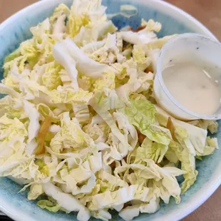Kalawe Salad (won bok with won ton chips and sesame seeds)
