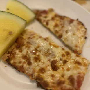 Cheese pizza for kids, that came with watermelon , chips and a soda