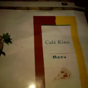 a menu with a slice of pizza