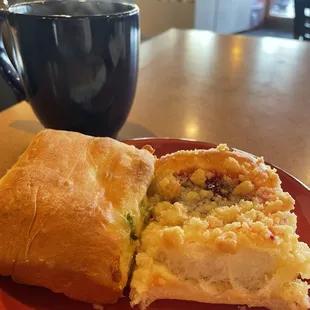 Sausage, jalapeño, and cheese kolache (left) &amp; raspberry kolache (right)