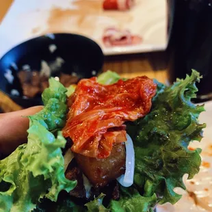 The rap kimchi meat onions everything's