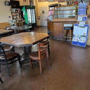 a wooden table and chairs