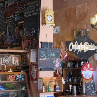 a bar with a clock on the wall