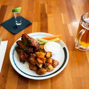 Chipotle chicken Wings and potatoes
