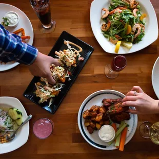 a table full of food and drinks