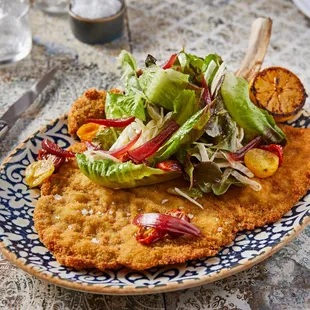 NEW! VEAL CHOP MILANESA local lettuce, shaved fennel, roasted heirloom cherry tomatoes