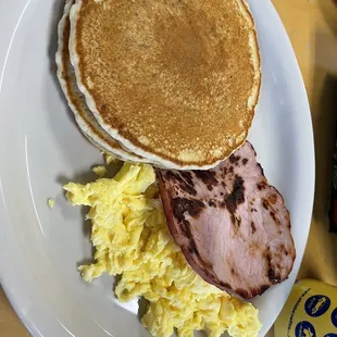 Eggs Lakeway with ham and blueberry pancakes