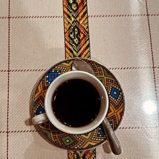 a cup of coffee on a table