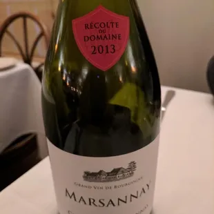 a bottle of wine on a table