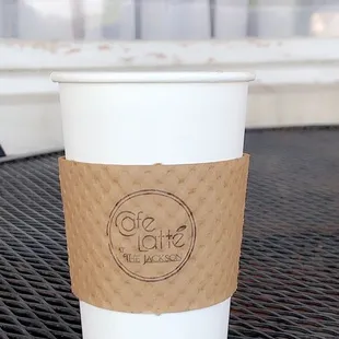 a cup of coffee on a table