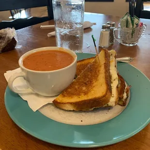 a grilled cheese sandwich with tomato soup