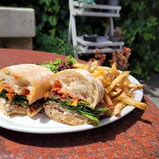 Lamb burger comes with fries and salad