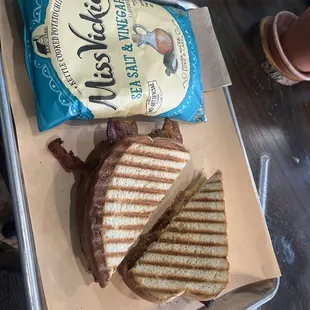 Pamento cheese and bacon sandwich with chips