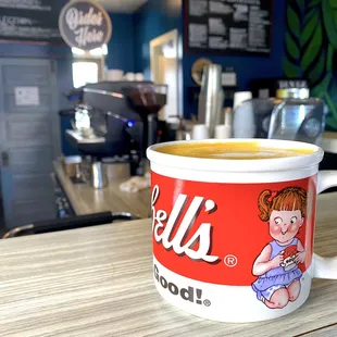 a cup of coffee on a table