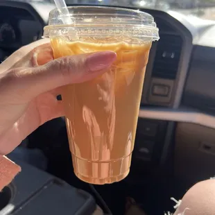 House made salted caramel syrup almond milk latte.