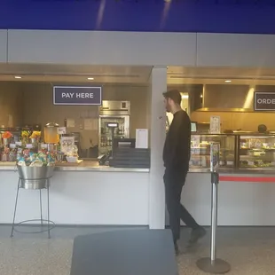 a man standing in front of a counter