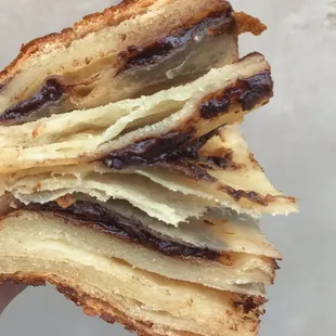 Buttery Layers on Our Chocolate Croissant. Baked Daily