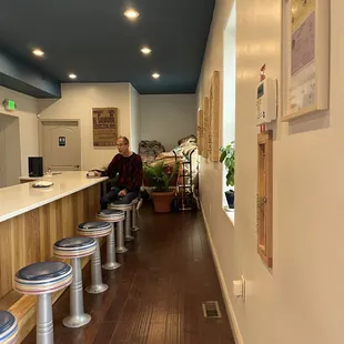 a man sitting at a counter